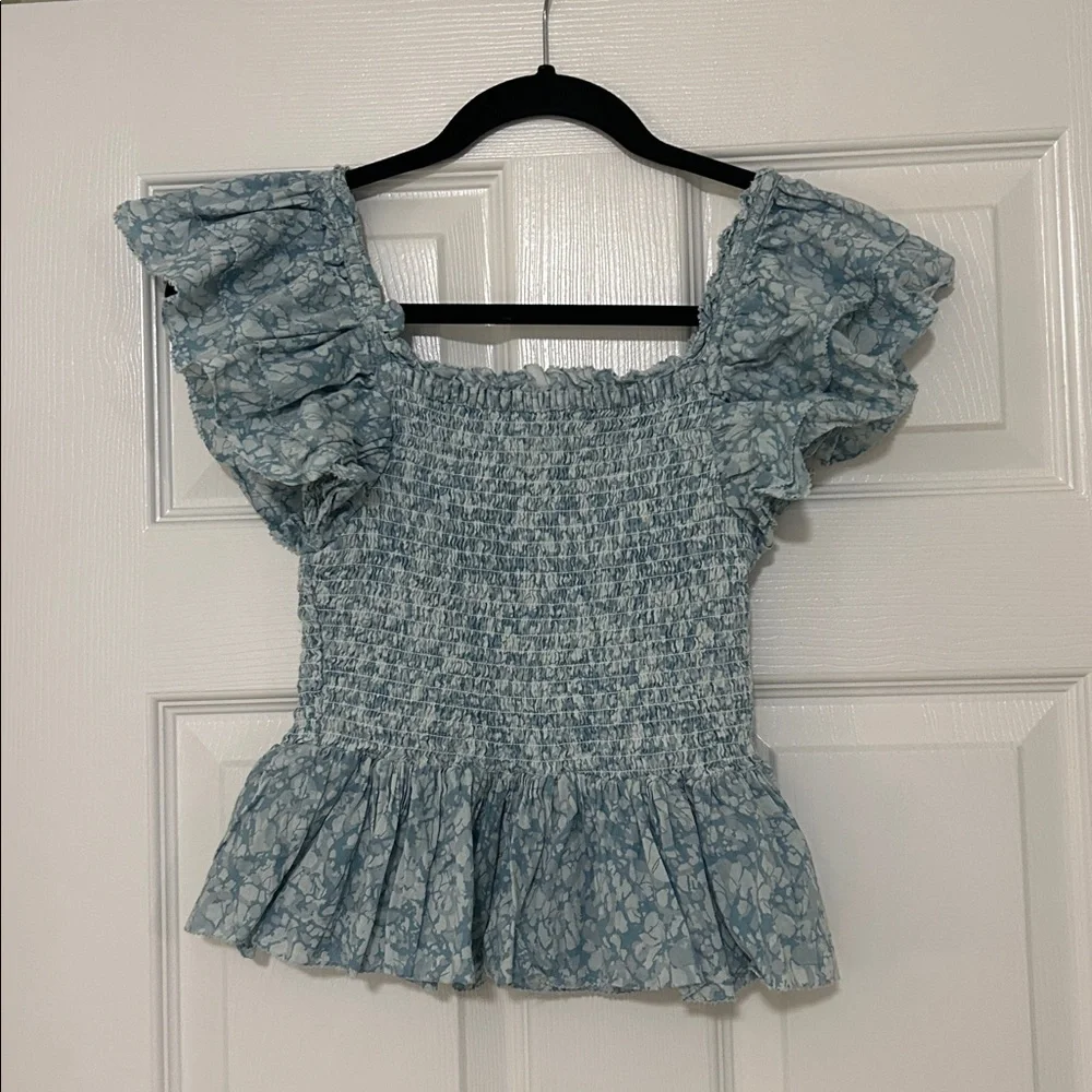Love the Label Anthropologie Blue Flutter Sleeve Smocked Peplum Blouse